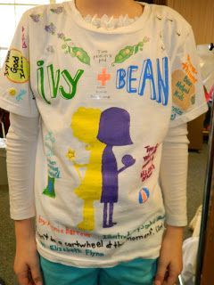 A child wears a t-shirt beaded as an register report as an example of creative book report craft